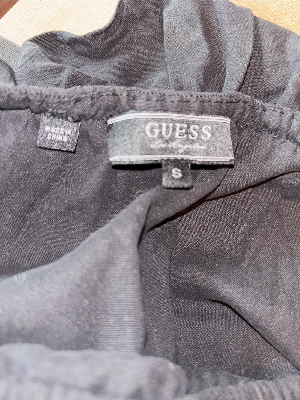 G by Guess Black Off-Shoulder Smocked Jumpsuit - Picture 6 of 6
